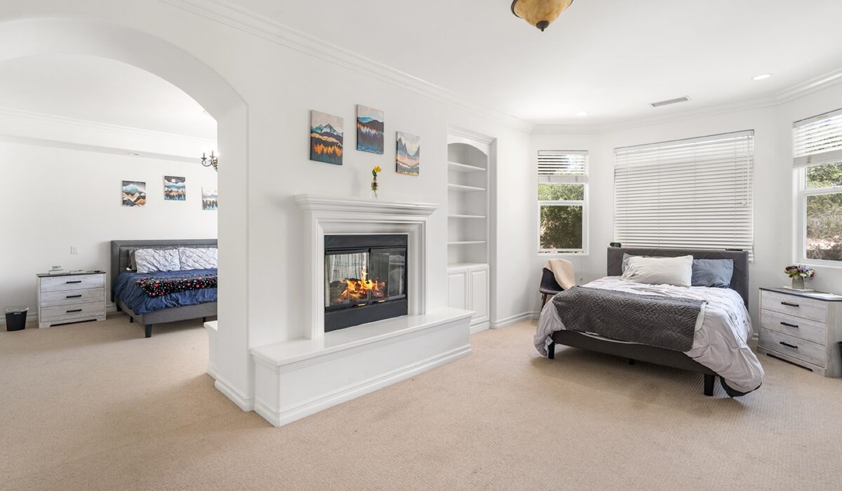 Bedroom with a fire place