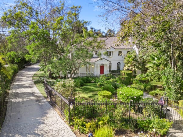 Side view of a house with a pink door