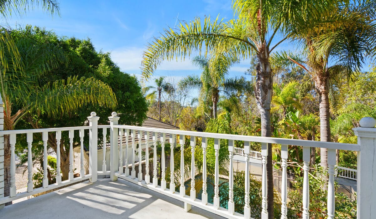 Balcony overlooking a pool