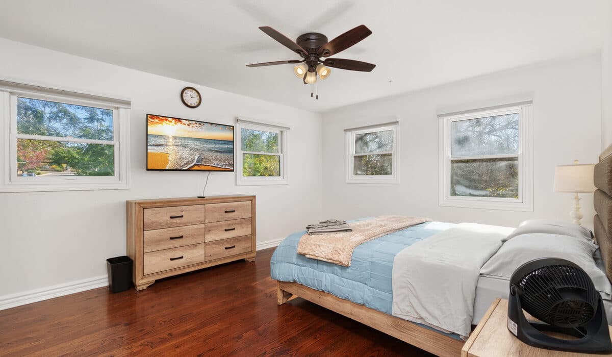 Bedroom with a dresser and tv