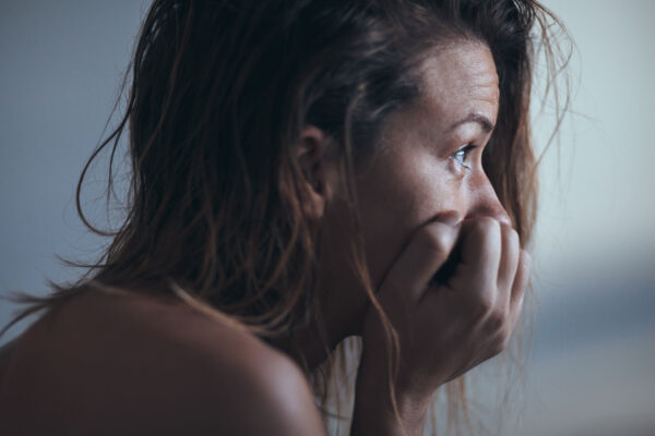 Woman sitting alone and depressed