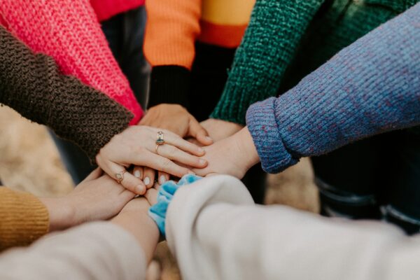 A group of people supporting each other